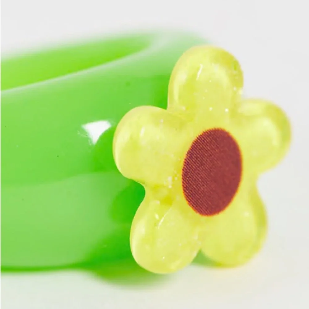ASOS DESIGN Yellow + Green Flower Ring